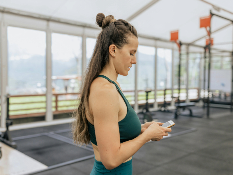 Beginner tracking workout progress using a fitness app.