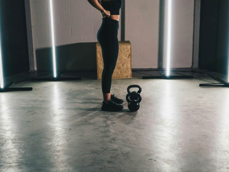 Functional training squat exercise with kettlebell for strength and mobility